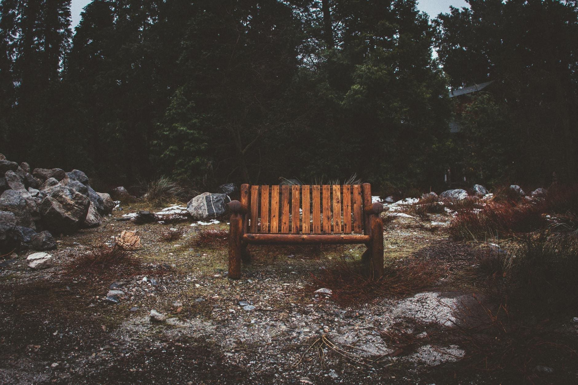 brown wooden park bench